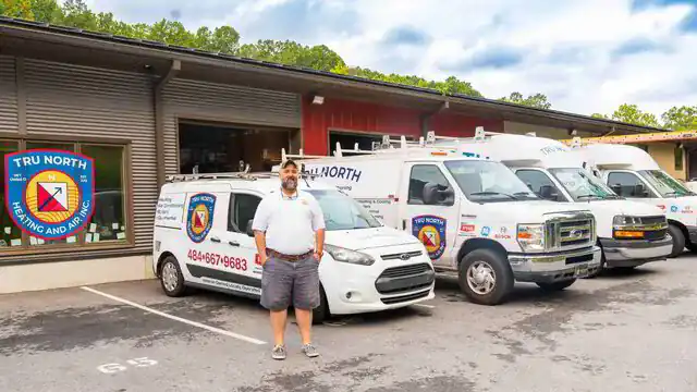 TruNorth Heating and Air team and vehicles